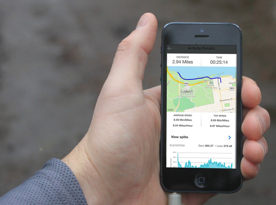 The Tribesports training app on an iPhone 5, showing an activity’s distance, route, splits and elevation